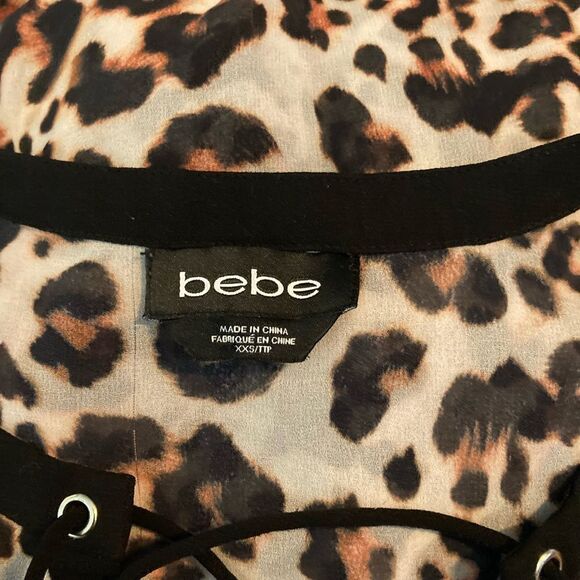 BEBE animal print sheer lace up blouse - Picture 2 of 7
